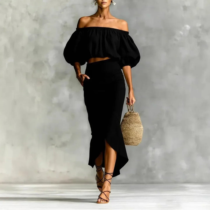 Casual chic off-shoulder women's skirt set: puff sleeve crop top & wrap midi skirt. Ideal for elegant summer wear.