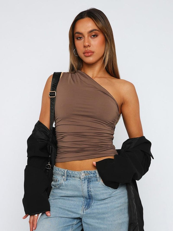 Versatile women's one-shoulder ruched top. Chic for parties, effortless for casual wear. Modern elegant style.