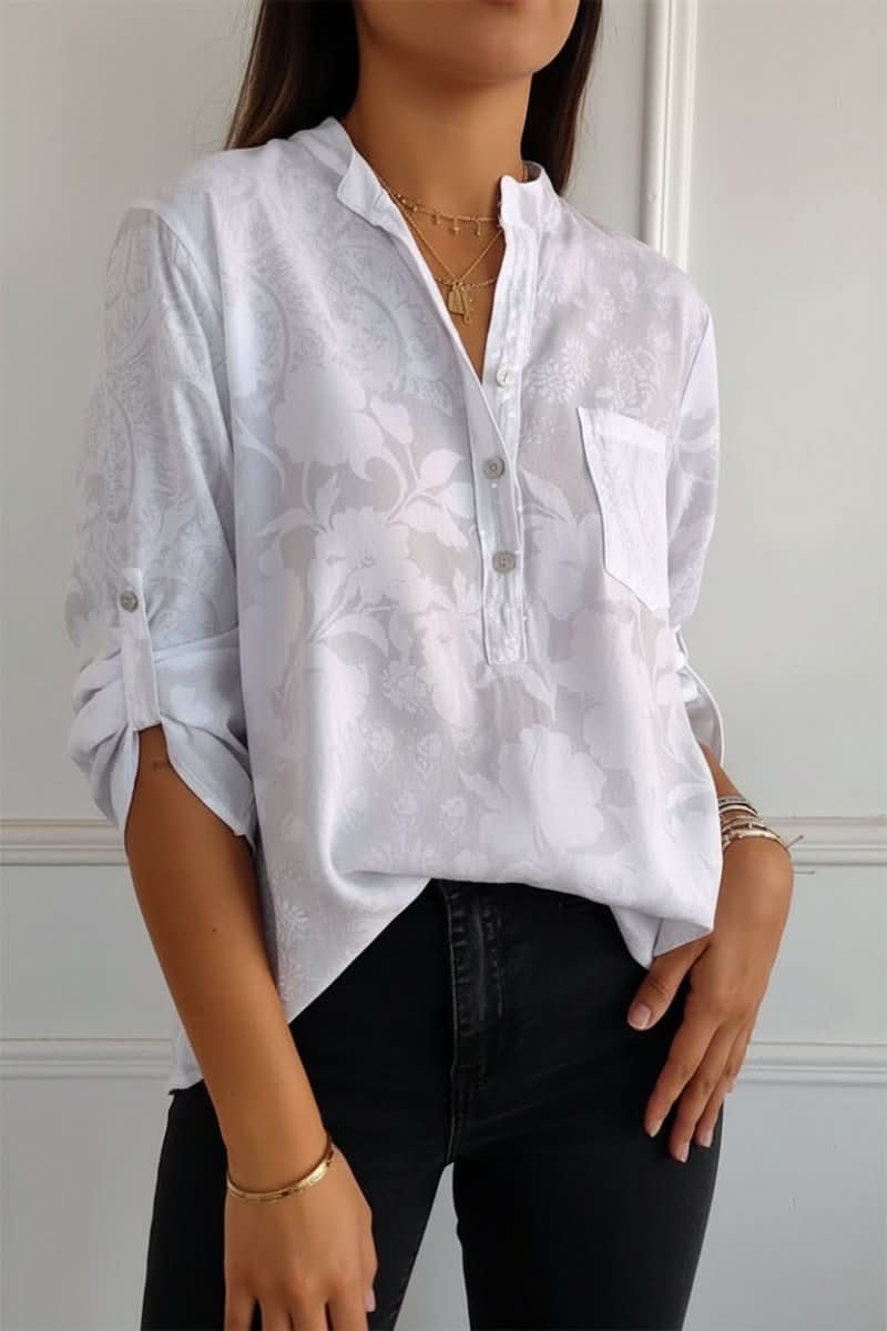Stylish women's printed long-sleeve top. Elegant casual chic blouse with front pocket for versatile wear.