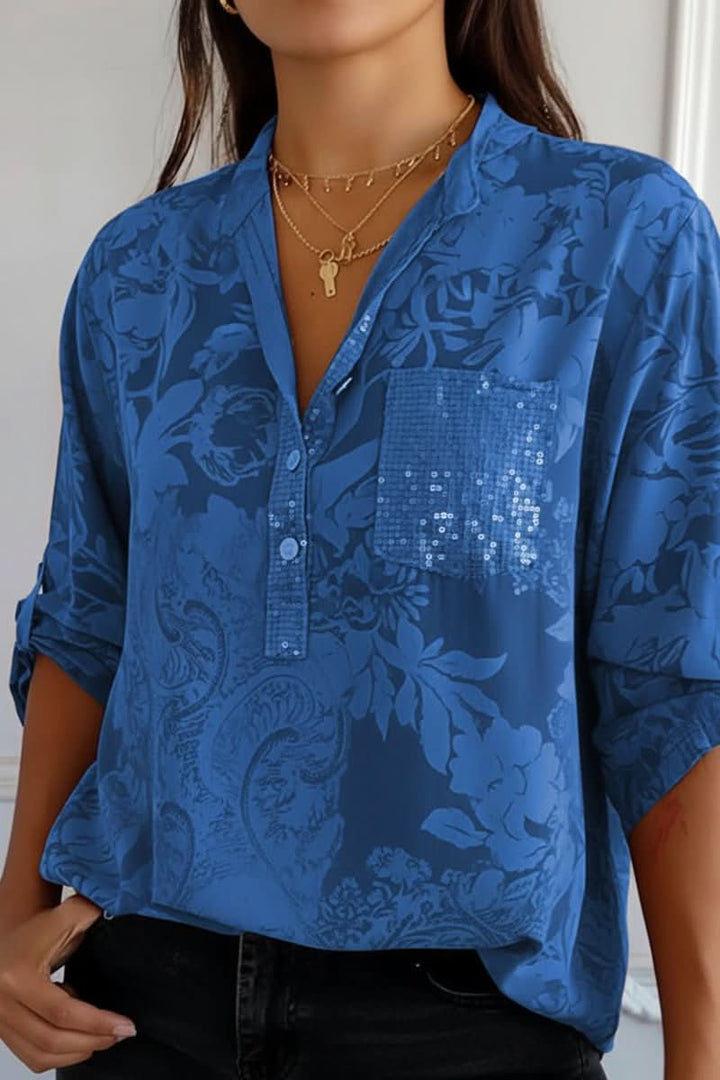 Versatile women's printed blouse. Chic long-sleeve top with front pocket, perfect for work or casual summer.