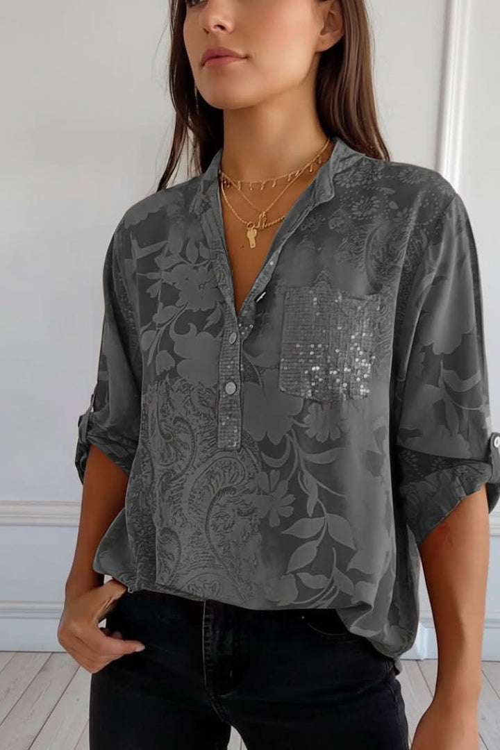 Women's long-sleeve printed blouse. Stylish versatile top with a front pocket, perfect as casual chic workwear.