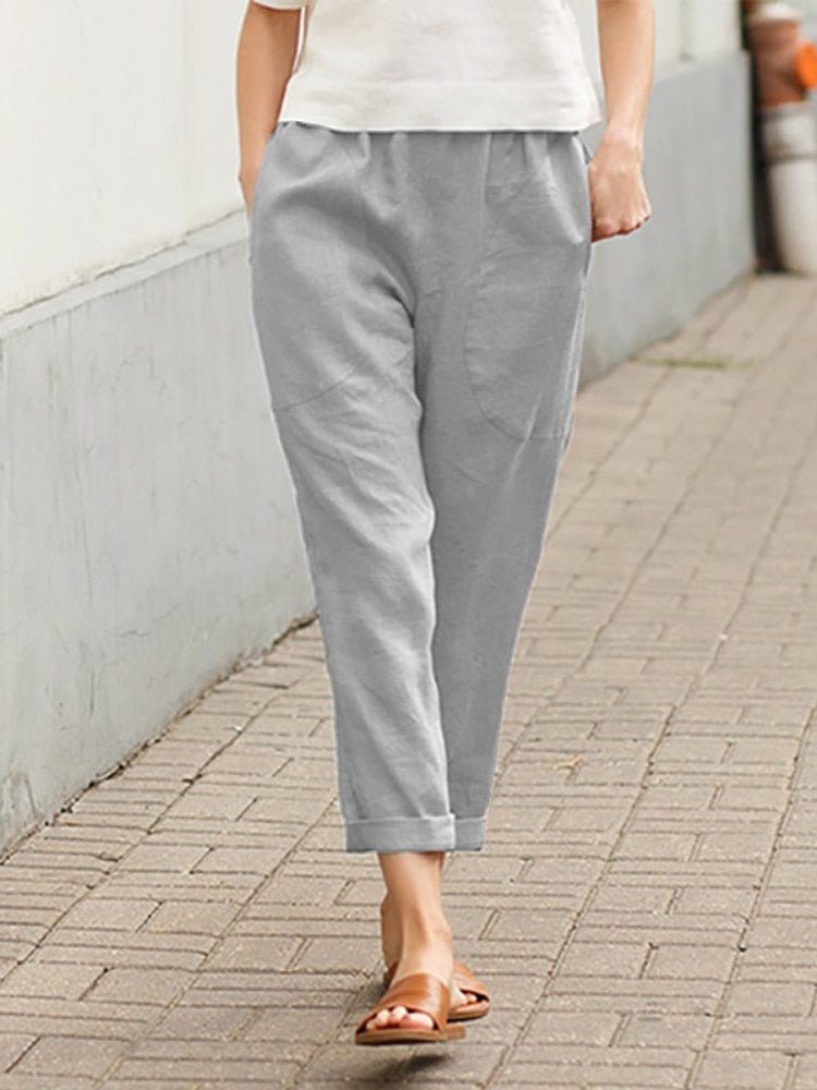 Stylish relaxed fit pants for women, offering comfort & a chic look in multiple colors.
