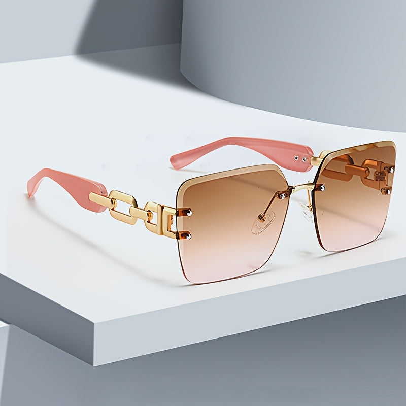 Fashionable women's rimless sunglasses with distinctive chain link temples, offering chic UV400 eye protection.