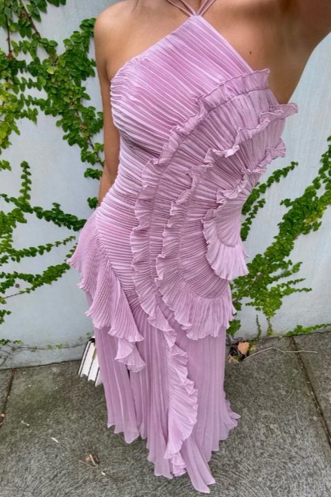 Formal women's wedding guest dress, a chic ruffle halter maxi gown for elegant events.