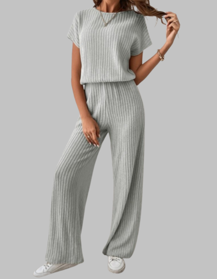 Stylish women's short sleeve top & flowy wide leg pants set, ideal for warm weather and comfy wear.