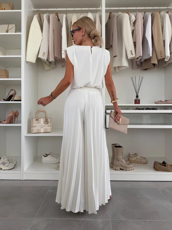 Elegant yet casual women's sleeveless top & wide leg pants matching set. Ideal for spring & summer fashion.