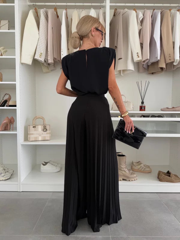 Women's two-piece matching set featuring a comfortable sleeveless top & flowy wide leg pants for a chic look.