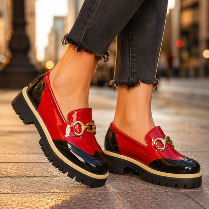 Elegant women's blue loafers with gold horsebit, perfect for chic style and everyday comfort.