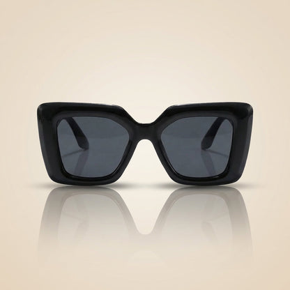 Women's accessories: sleek square sunglasses with chic frames and UV protective lenses.