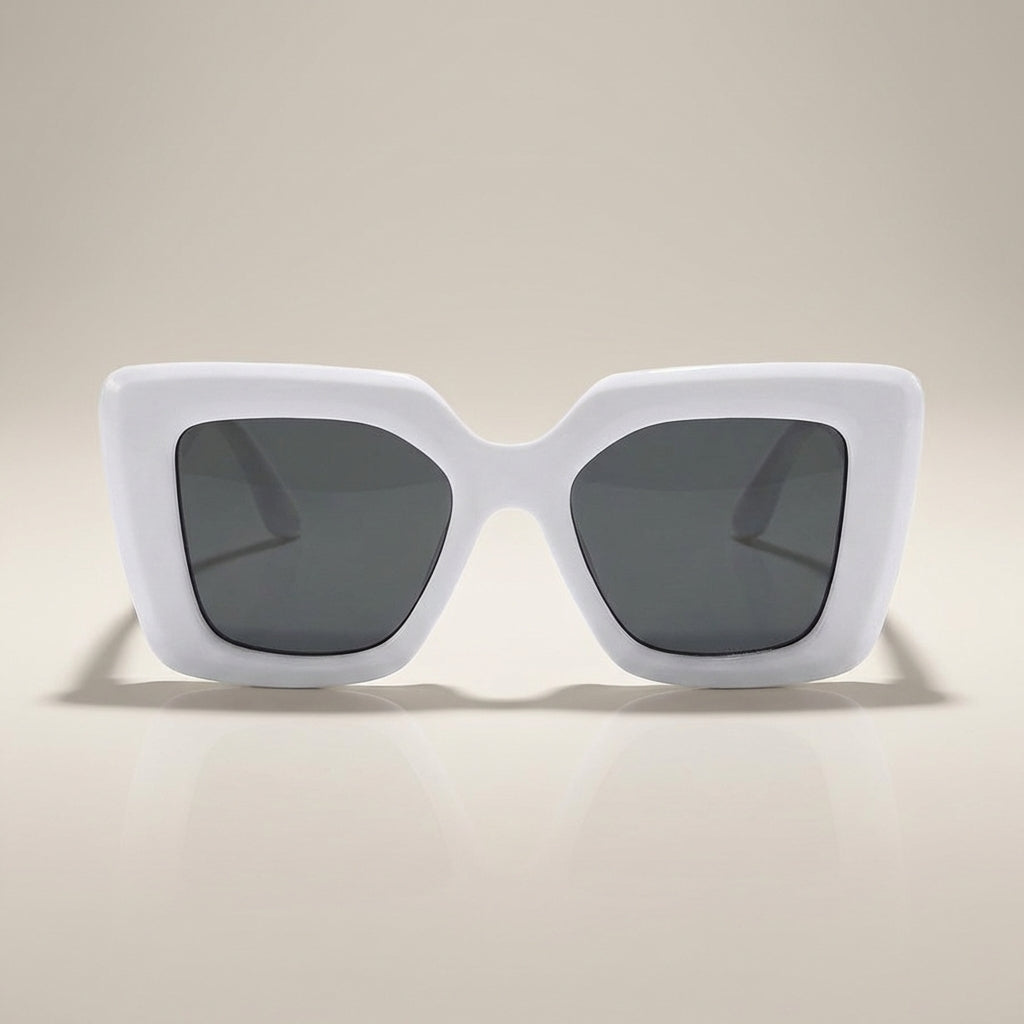 Close-up of women's chic square sunglasses, highlighting the intricate frame detail and reflective lenses.