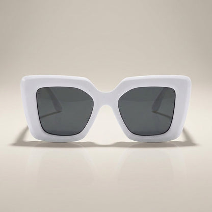 Close-up of women's chic square sunglasses, highlighting the intricate frame detail and reflective lenses.