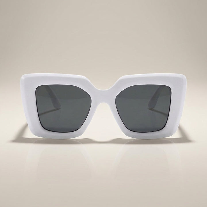 Close-up of women's chic square sunglasses, highlighting the intricate frame detail and reflective lenses.