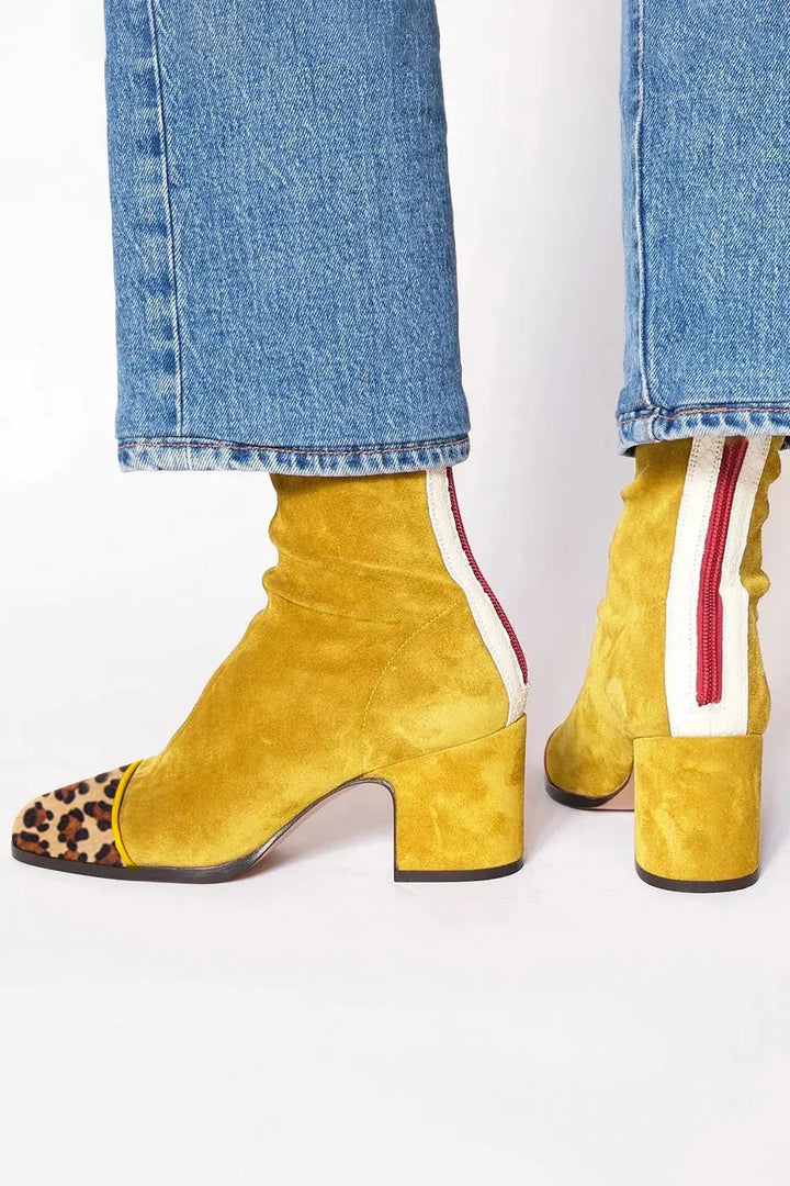 Premium women's square toe heeled boots, sleek design with a comfortable block heel.