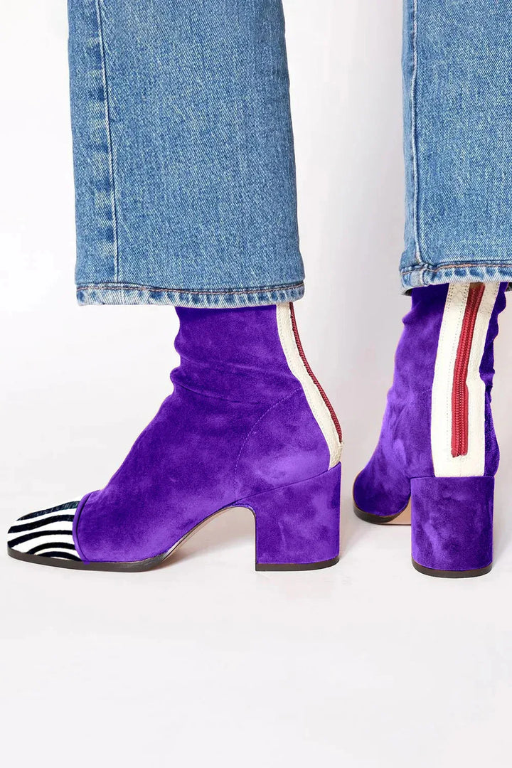 Elegant women's heeled boots, square toe, versatile chic style & modern comfort.