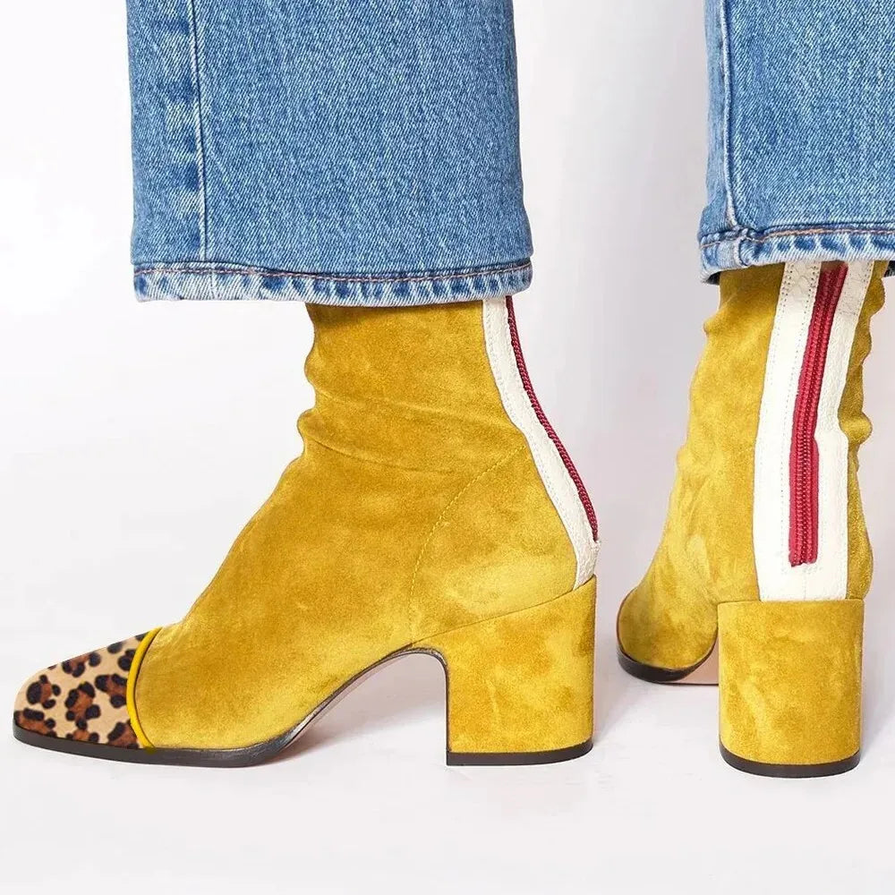 Modern women's square toe heeled boots, comfortable block heel for fashion-forward looks.