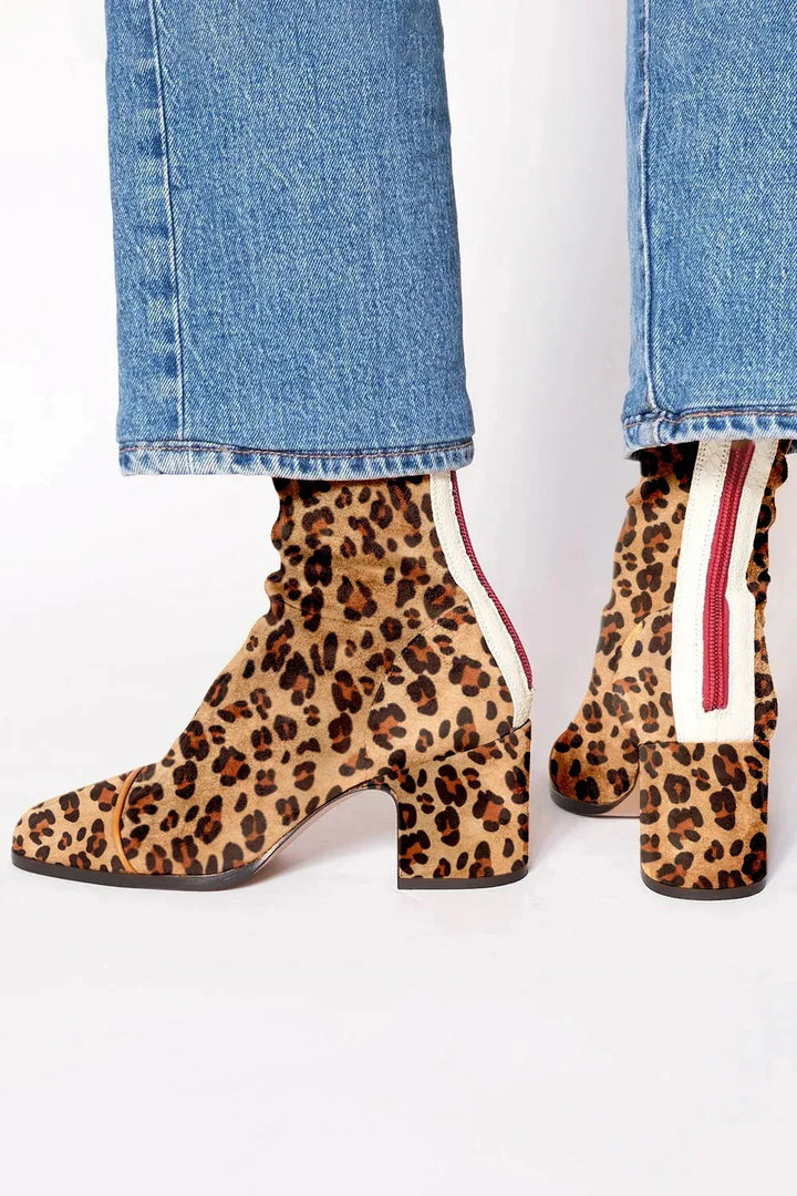 Stylish women's dress boots, square toe, block heel, perfect for chic outfits.