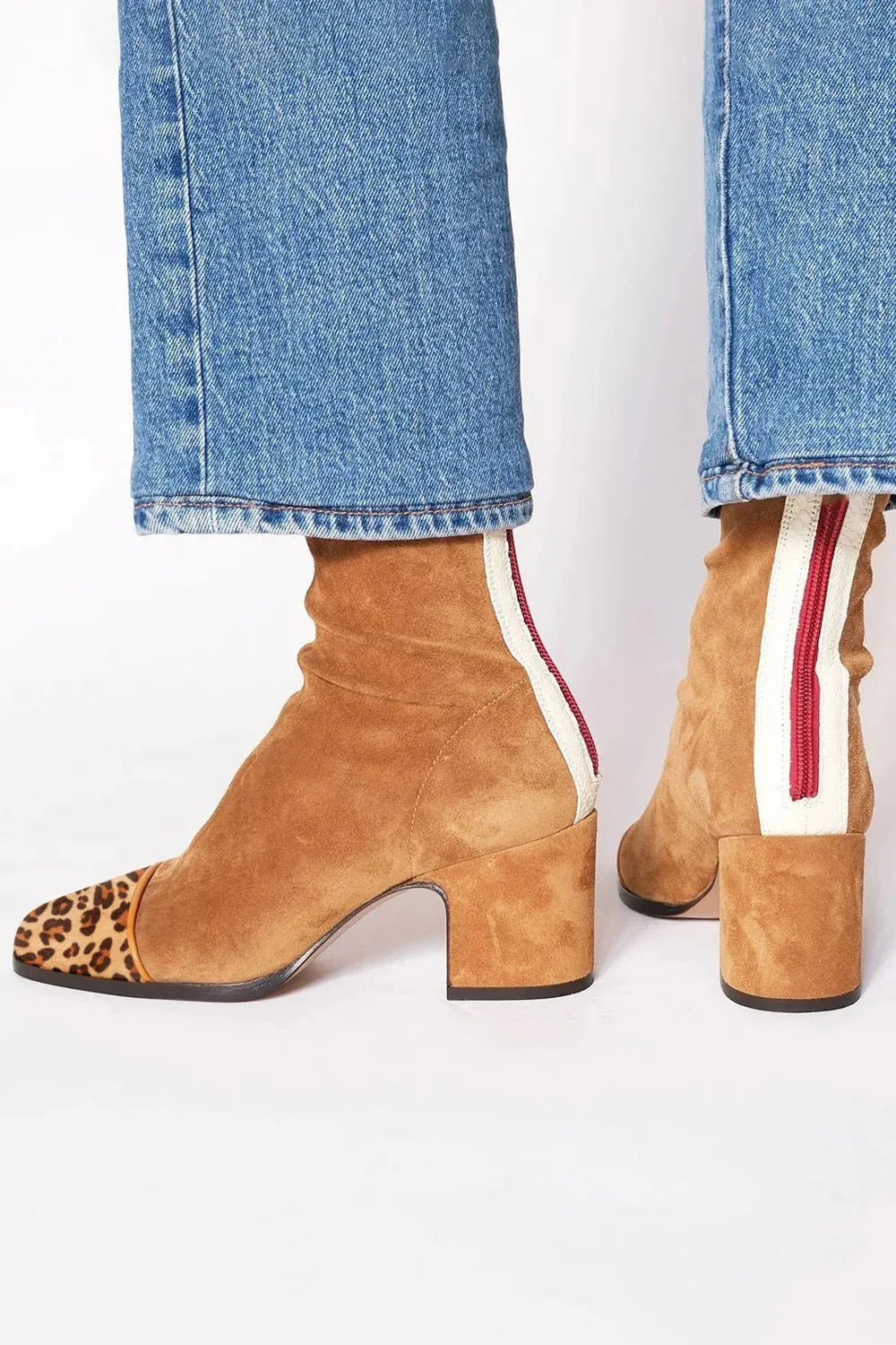 Chic women's square toe heeled boots, block heel, offering modern comfort & stylish versatility.