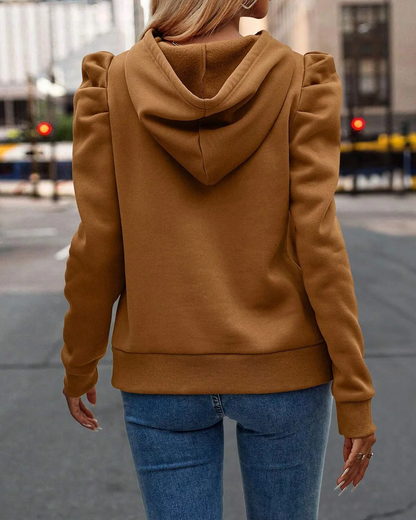 Stylish women's apparel: chic stacked sleeve hoodie, a versatile fashion top for everyday wear.