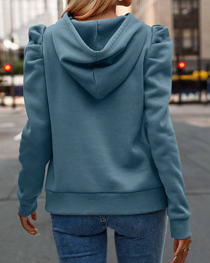 Stylish women's stacked sleeve hoodie with ruched shoulders, a chic sweatshirt for casual everyday wear.