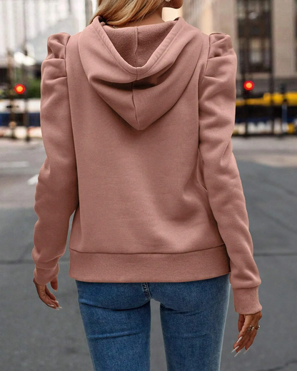Modern women's stacked sleeve sweatshirt with ruched shoulders, ideal for casual wear.