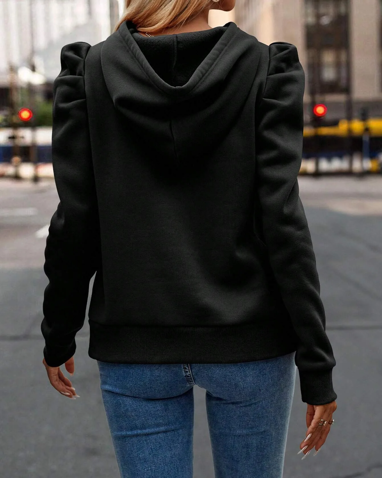 Modern women's hoodie with elegant stacked sleeves & comfortable fit, perfect for casual wear.