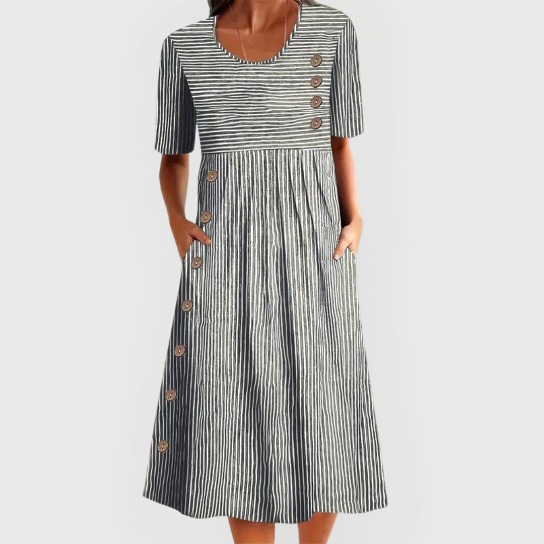 Comfortable women's striped midi dress featuring 3/4 sleeves, ideal as a casual summer dress.