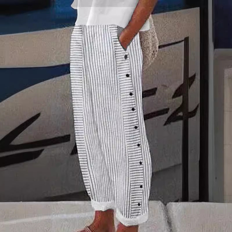 Women's chic striped pants with button accents, relaxed fit for everyday elegance and comfort.