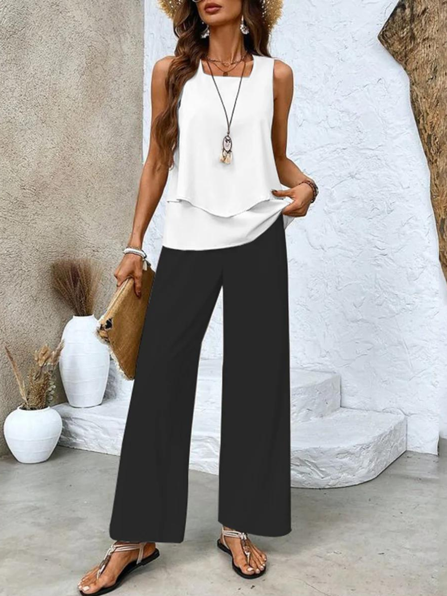 Women's stylish two-piece set for summer. Flowy top & comfortable wide-leg pants. Casual chic elegance.
