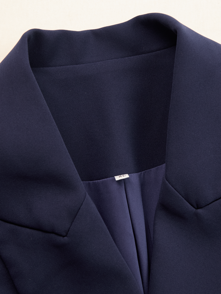 Women's sophisticated long sleeve blazer midi dress, tailored fit, ideal for elegant occasions.