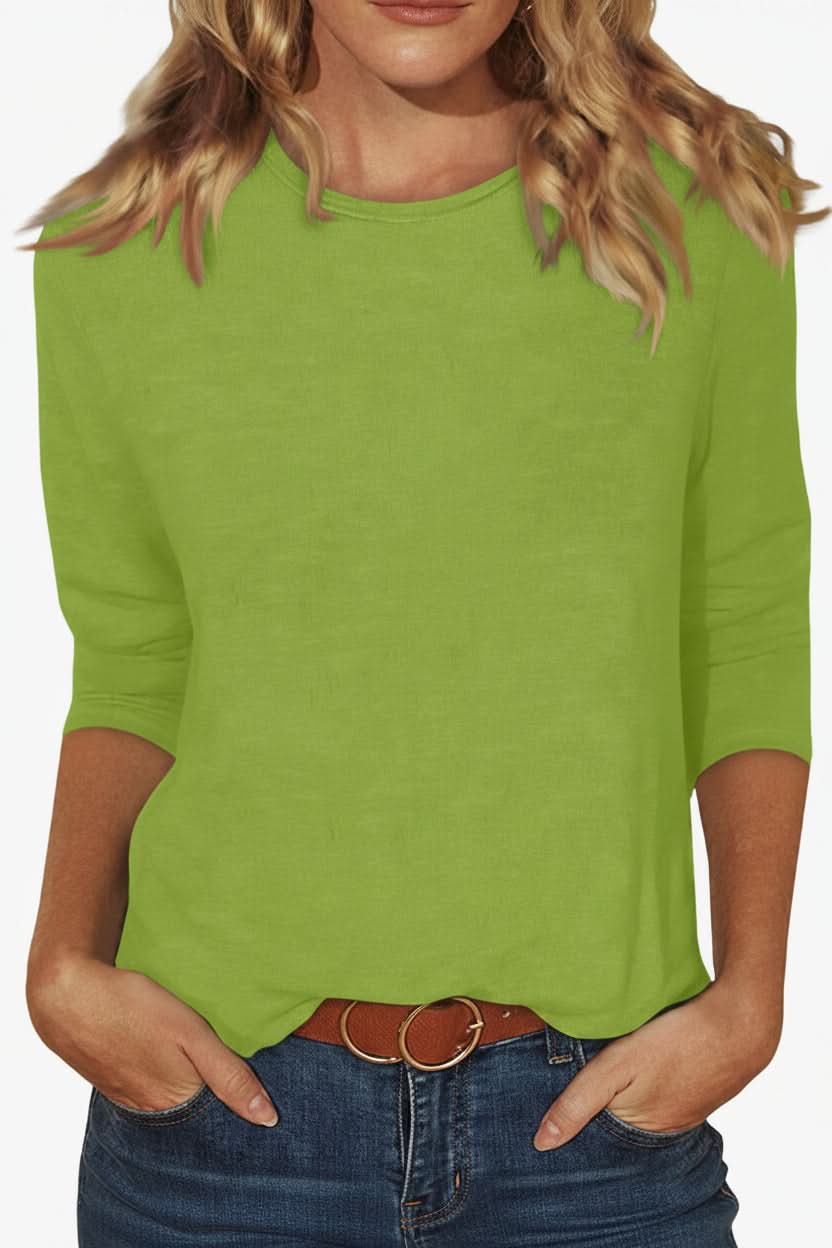 Women's elegant three-quarter sleeve blouse, a chic top for effortless versatile fashion looks.