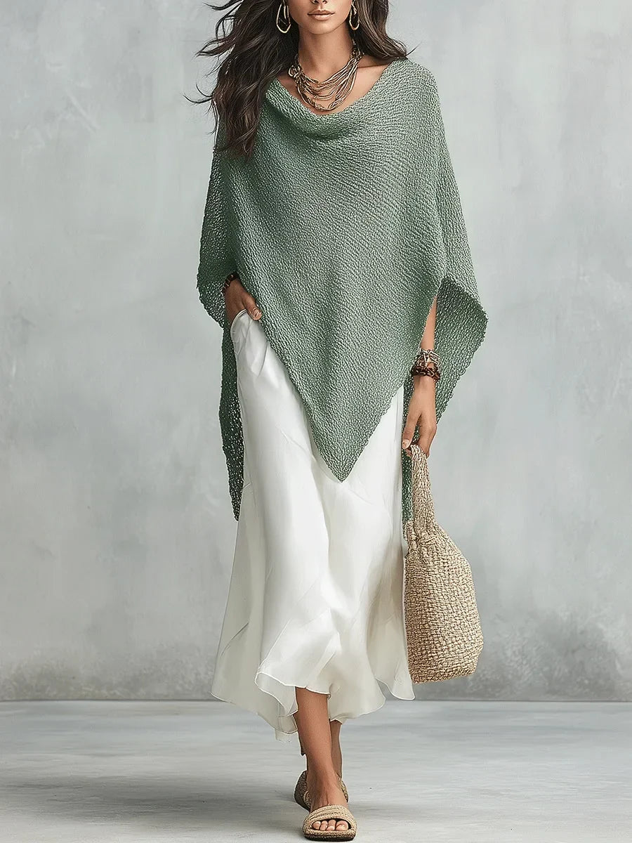 Stylish women's batwing poncho top & sleeveless maxi dress set. Perfect for casual or elegant occasions.