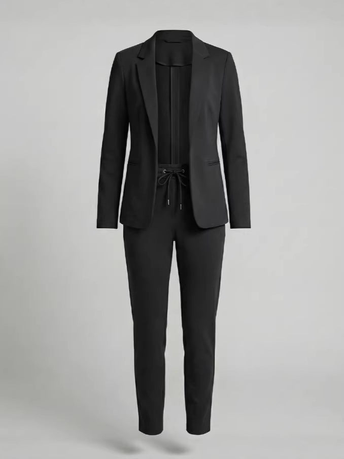 Women's versatile two-piece suit set, including a stylish blazer and tailored dress pants. Modern design.