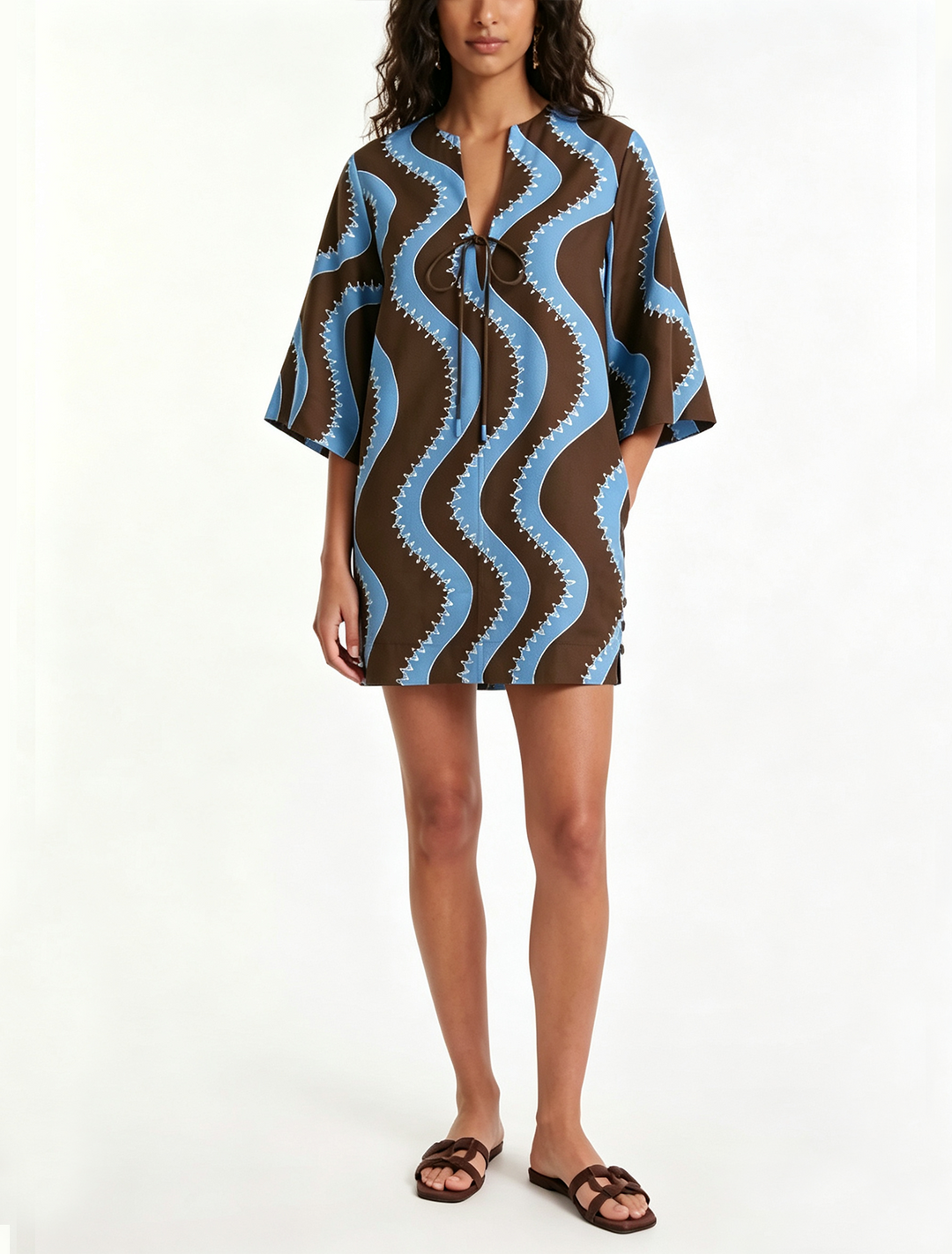 Women's chic wave print mini dress with collar & button front. Perfect casual summer or vacation wear.