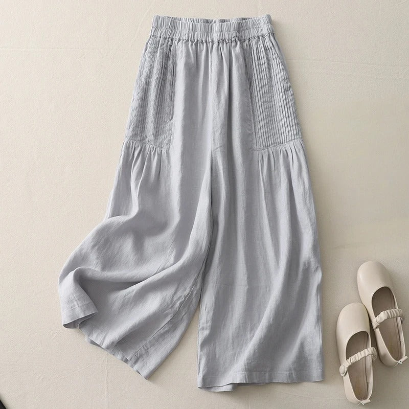 Flowy wide leg trousers for women, soft fabric, relaxed fit. Ideal for casual comfort & stylish summer outfits.
