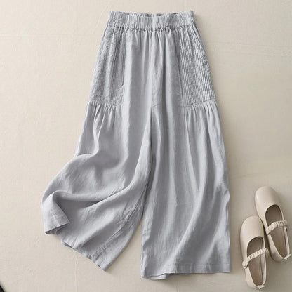 Flowy wide leg trousers for women, soft fabric, relaxed fit. Ideal for casual comfort & stylish summer outfits.