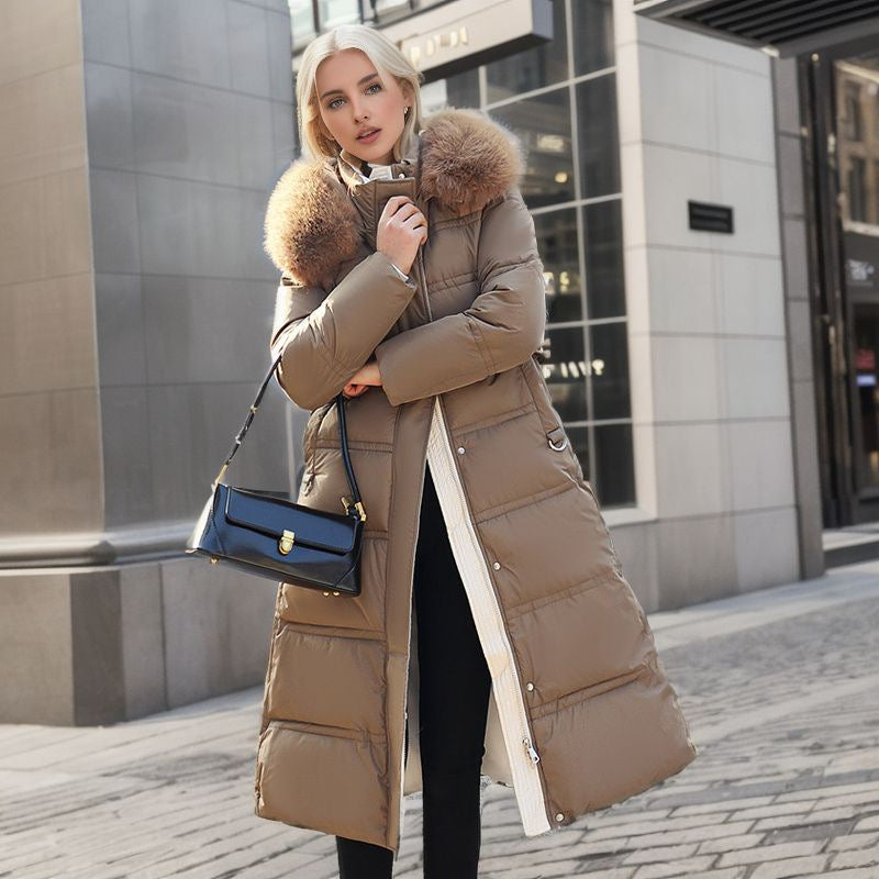 Women's elegant winter coat with a detachable hood, offering a chic and cozy solution for cold days.