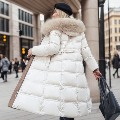 Chic women's outerwear, a versatile winter coat with a removable hood for changing weather.