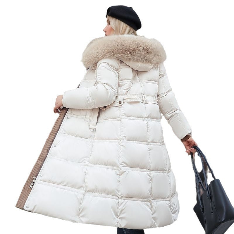 Elegant women's winter coat with a removable hood, ideal for cold weather outerwear and a chic look.