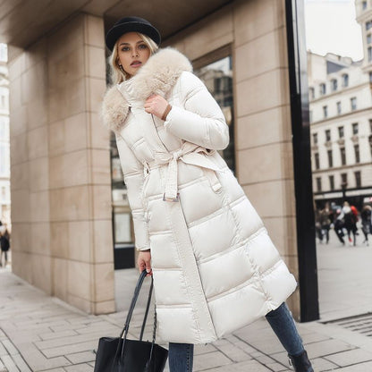 Cozy women's chic winter jacket, offering warmth and style with a detachable hood for versatility.