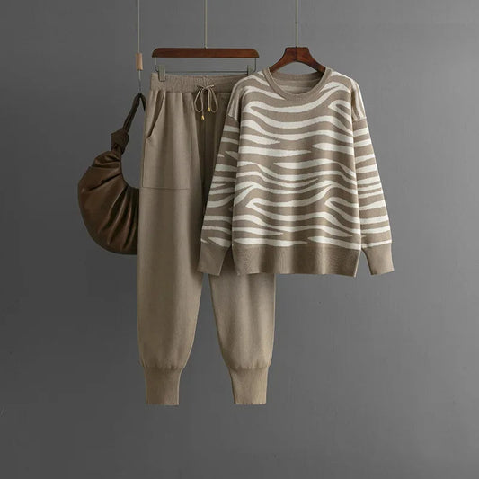 Women's chic zebra knit loungewear set. Cozy two-piece sweater & joggers for stylish comfort.