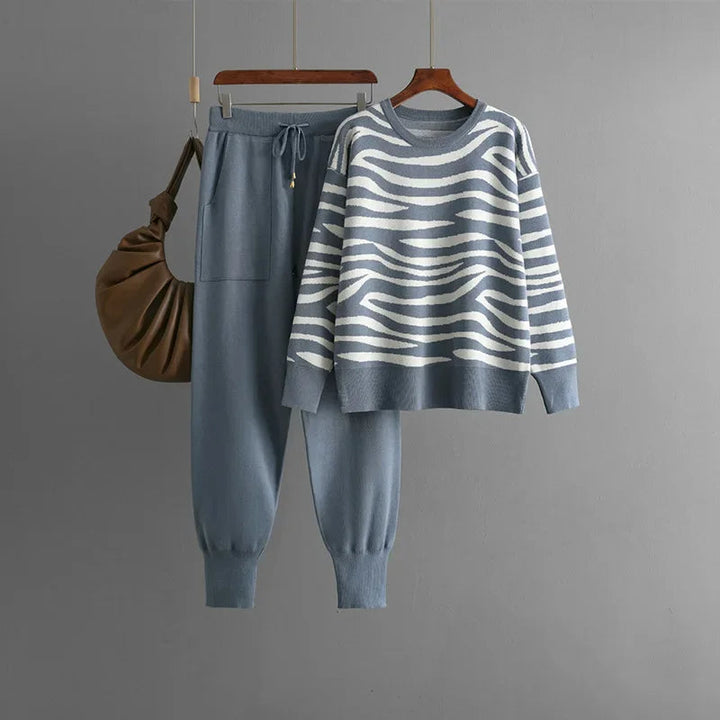 Side view of women's zebra knit loungewear set, highlighting the relaxed fit & stylish print.