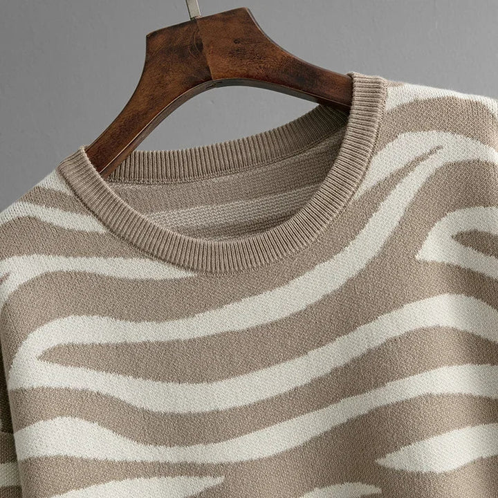 Relaxed fit women's zebra knit loungewear set, featuring soft sweater & joggers for everyday style.