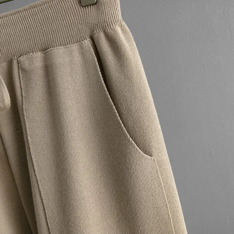 Detail shot: Soft, plush knit fabric with a distinctive zebra print, ideal for cozy women's loungewear.