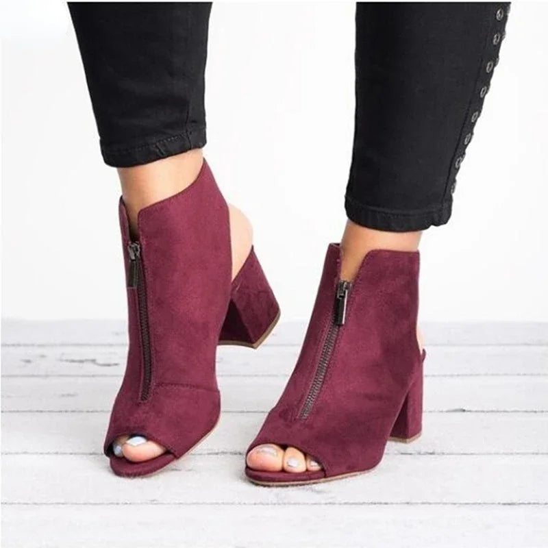 Comfortable women's block heels with elegant zip detail, perfect for any occasion.