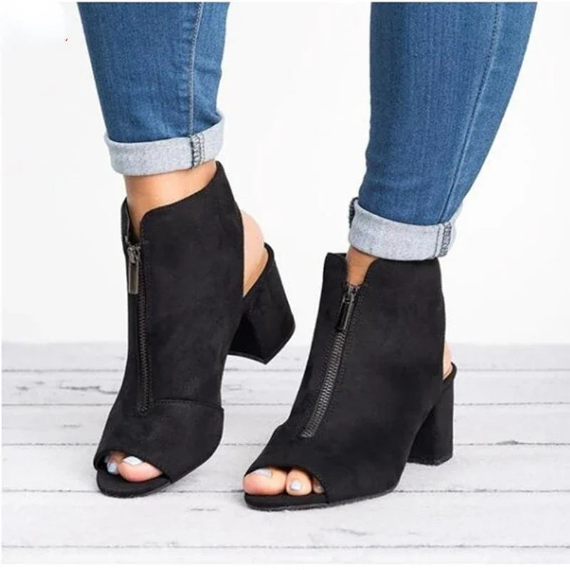 Stylish open-toe block heels for women, featuring a secure and fashionable zip closure.