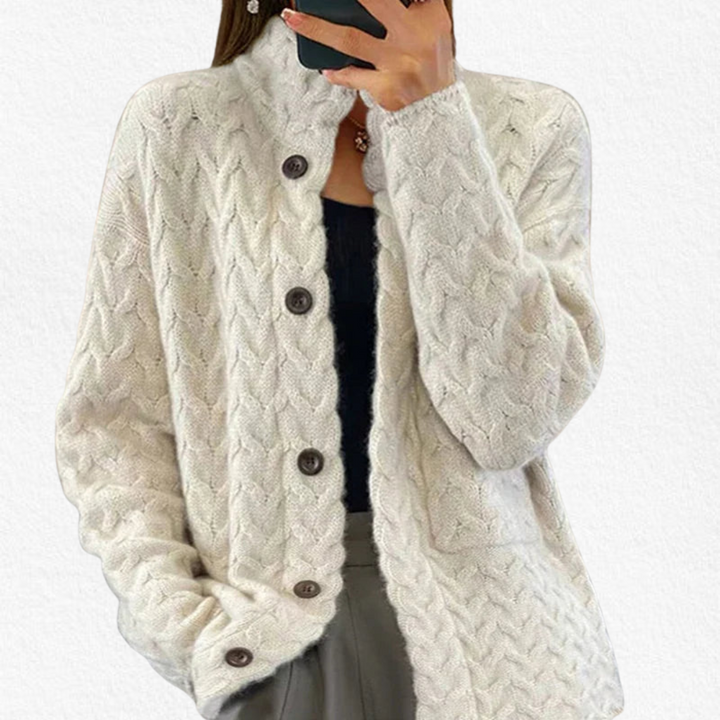 Women's chunky cable knit cardigan with button-front closure, perfect for cozy fall & winter layering. Chic comfort.