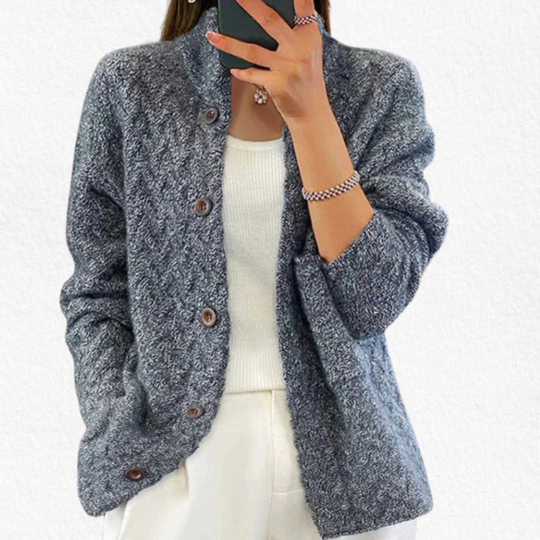 Cozy women's chunky cable knit button cardigan, a stylish and warm layering piece for chic fall & winter fashion.
