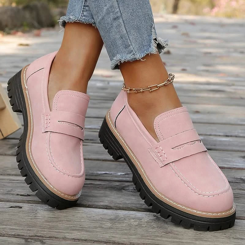 Trendy women's platform loafers, featuring a chunky sole and comfortable fit for everyday wear.