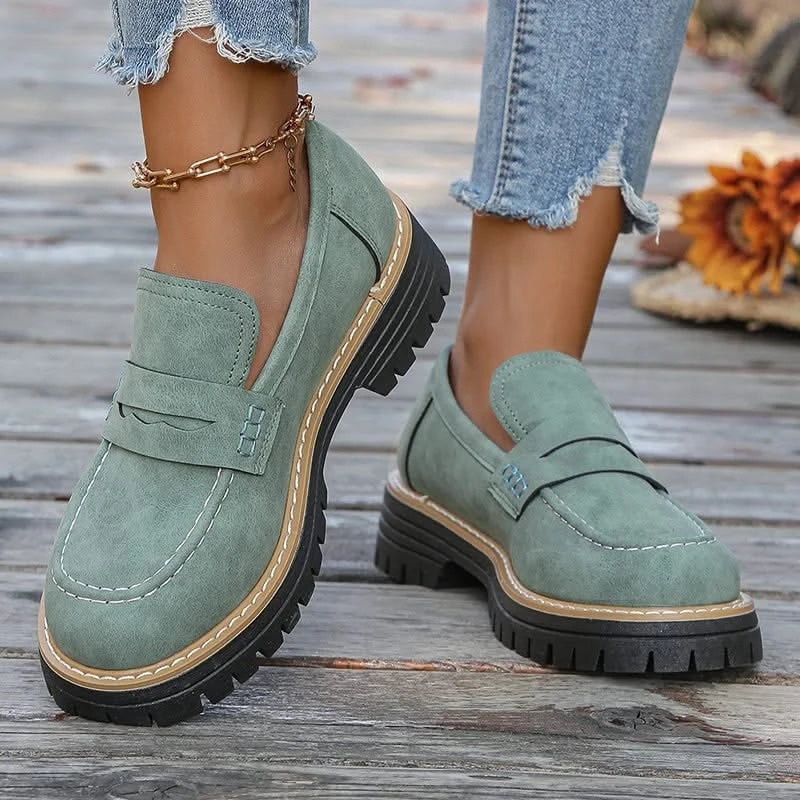 Fashion footwear: women's chunky platform loafers, a stylish and comfy slip-on choice.