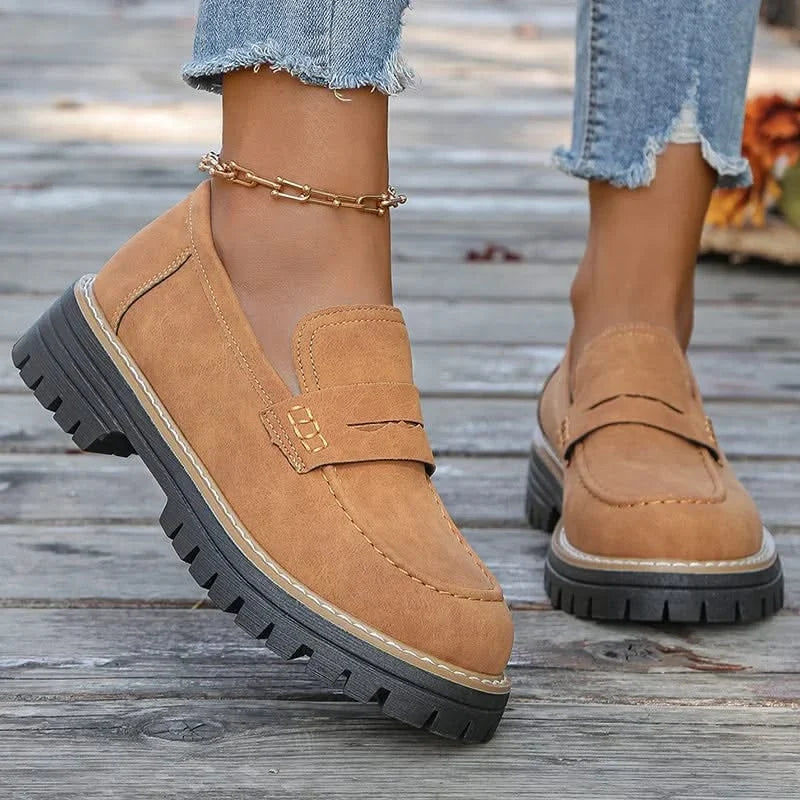 Trendy women's platform loafers with a chunky sole, comfortable for casual and dress wear.